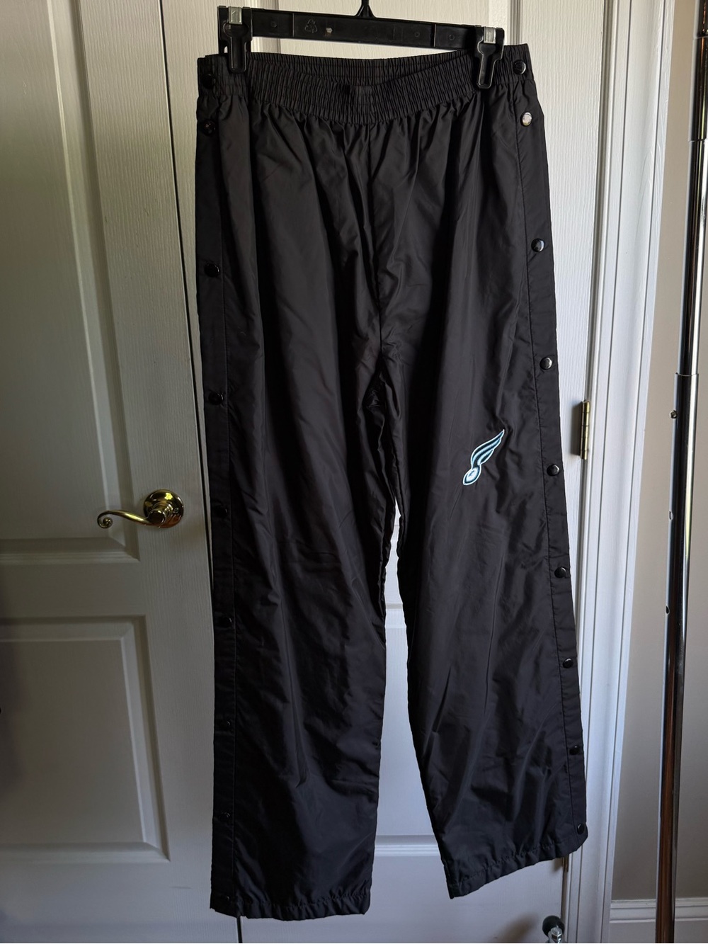 Arcadia Black Snap-Button Track Pants with Teal Logo